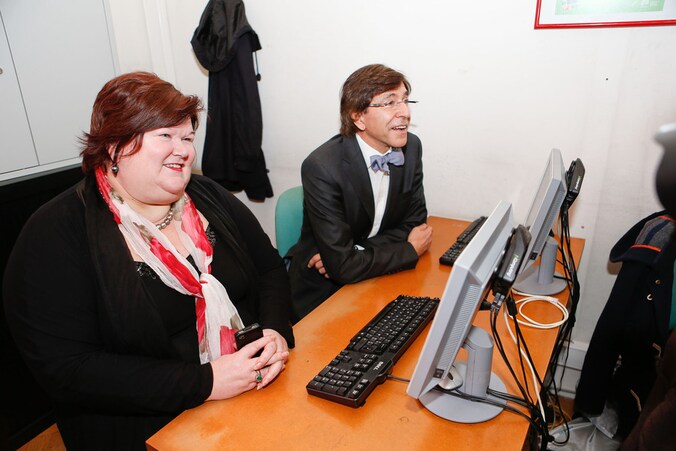 Staatssecretaris voor Asiel en Migratie Maggie De Block naast premier Elio Di Rupo.