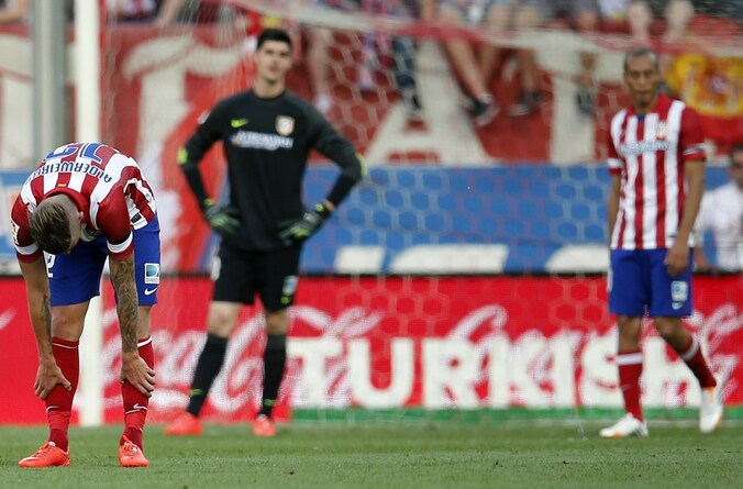 Teleurstelling bij Courtois en Alderweireld (l), die in de fout gingen bij de tegengoal.