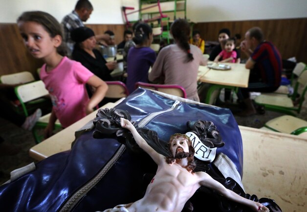 Christenen die voor IS zijn gevlucht schuilen in een school in de Koerdische stad Arbil.