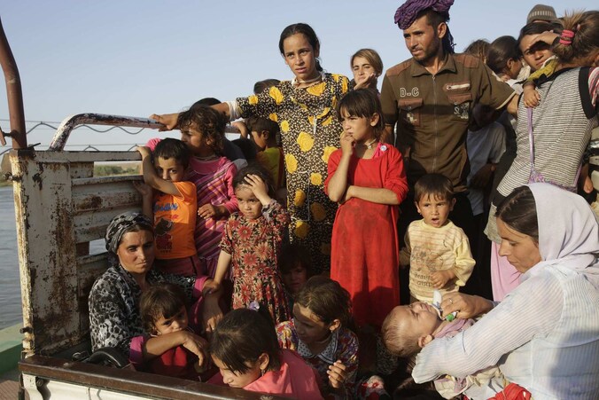 Jezidi's uit Sinjar op de vlucht voor het geweld van IS.