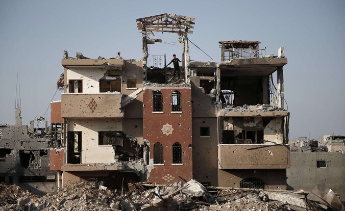 Vernielde huizen in de Shejaiya wijk in Gaza.