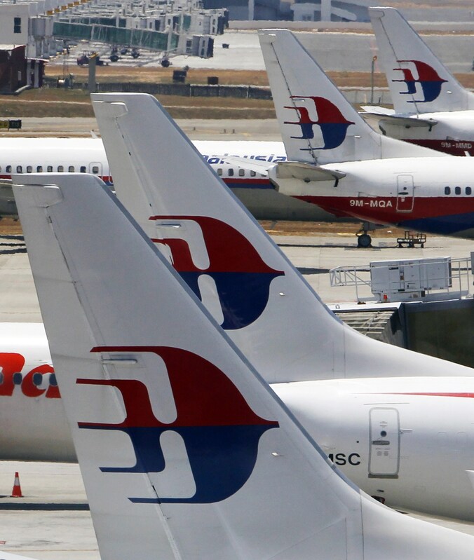 Vliegtuigen van Malaysia Airlines op het tarmac.