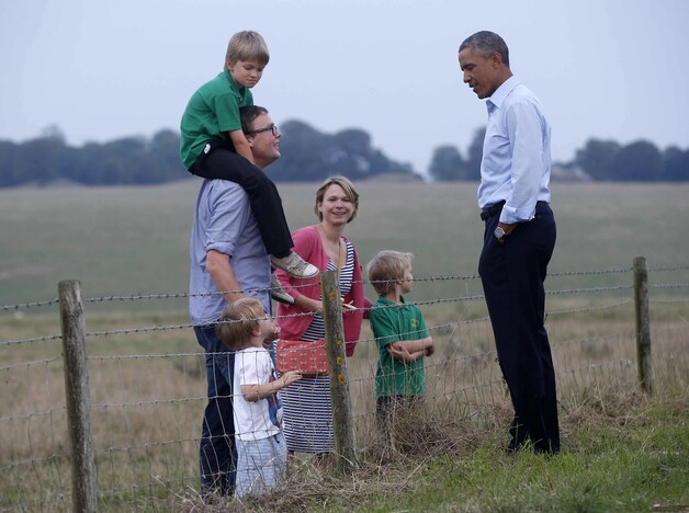 Obama nam even de tijd om de familie te begroeten.