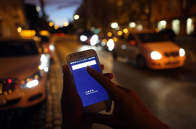 Met Uber kan je een chauffeur bestellen via een app voor de smartphone.