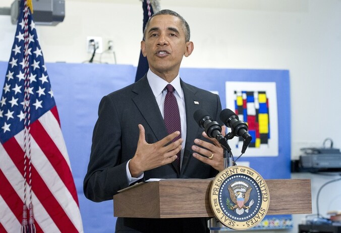 President Barack Obama dinsdag op bezoek bij de Powell Elementary School in Washington.