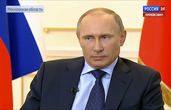 Vladimir Poetin tijdens de persconferentie.
