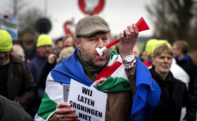 Een actievoerder tegen de gasboringen in Nederland.