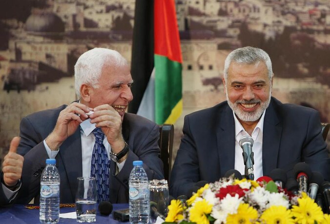 Azzam Al-Ahmed van Fatah en Ismail Haniyeh van Hamas.