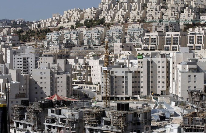 Een nederzetting in Oost-Jeruzalem. De Israëlische woningen in bezet gebied is een belangrijk obstakel voor de EU-ministers.
