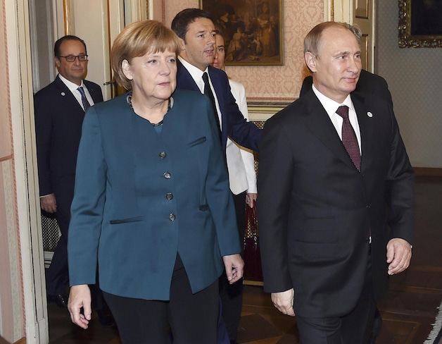 Merkel en Poetin vorige maand tijdens de Euro-Aziatische top in Milaan.