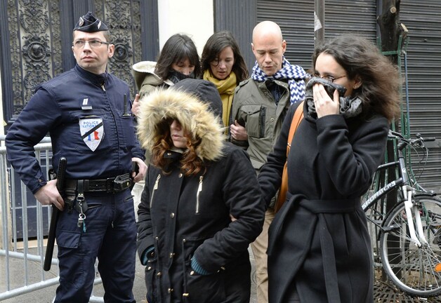 Journalist Laurent Léger (tweede van rechts).