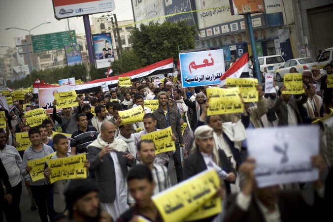 Demonstranten protesteren tegen de Houthi-rebellen, die de controle over Sanaa verwierven.