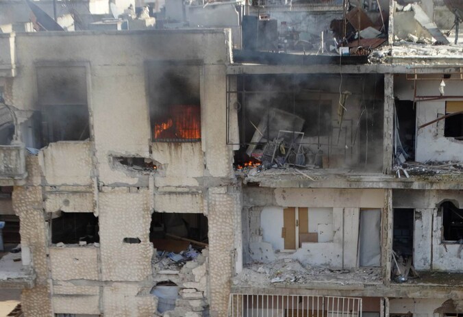 Verwoeste gebouwen in de Syrische stad Homs.
