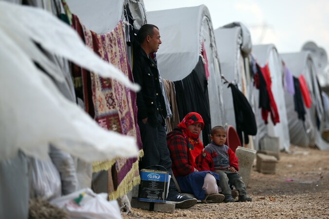 Syrische vluchtelingen in een vluchtelingenkamp.