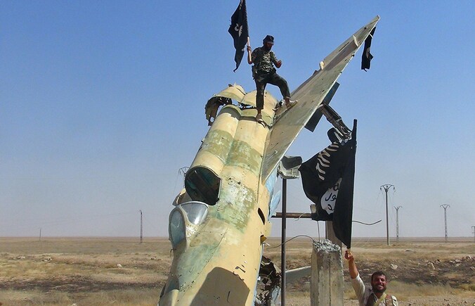 Leden van Islamitische Staat in Raqqa, Syrië.