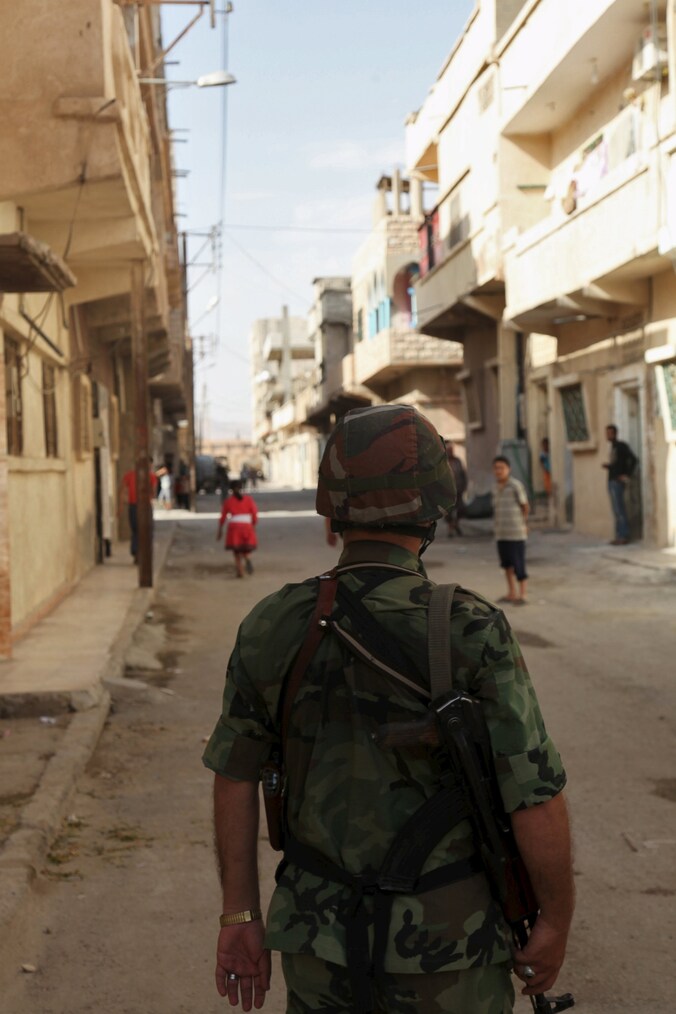 Een foto van een Syrische soldaat in de straten van Palmyra, gedateerd op 19 mei.