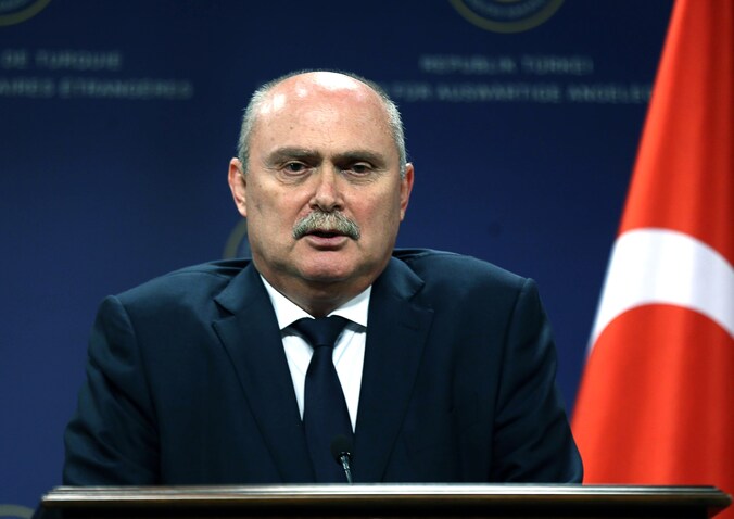 Turks minister van Buitenlandse Zaken Feridun Sinirlioglu.