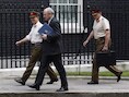 De Britse minister van Defensie Nick Harvey (m).