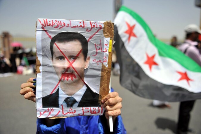 Protest in Jemen tegen het regime van Assad.