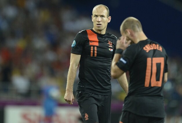 De ontgoocheling bij Sneijder en Robben na de dodelijke 2-1.