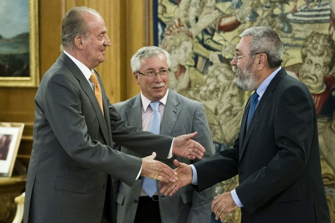 Juan Carlos met Candido Mendez en Ignacio Fernandez Toxo.