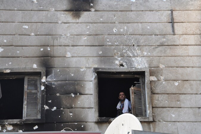 Een Syrische vrijheidsstrijder in Aleppo.