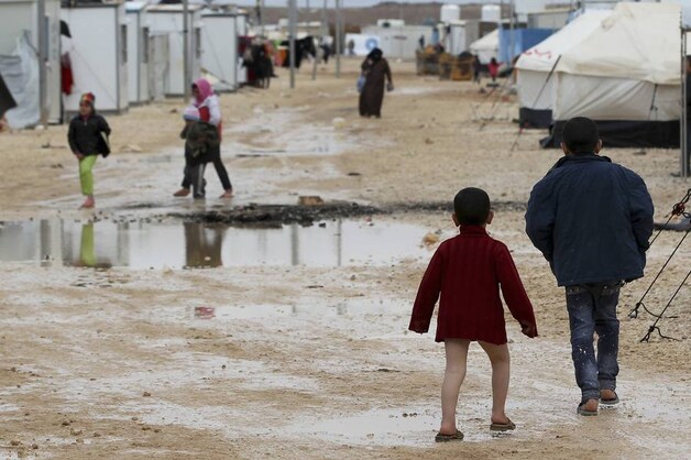 Syrische vluchtelingen in het Jordaanse vluchtelingenkamp van Zaatari.