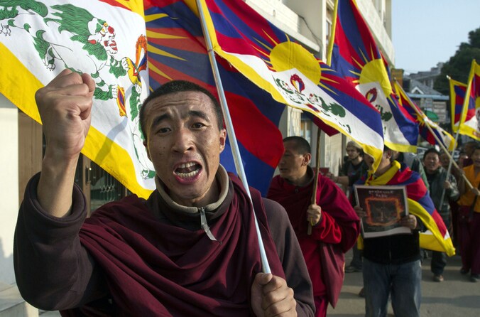 Tibetanen hoouden in het Indiase Dharmasala een steunbetoging.