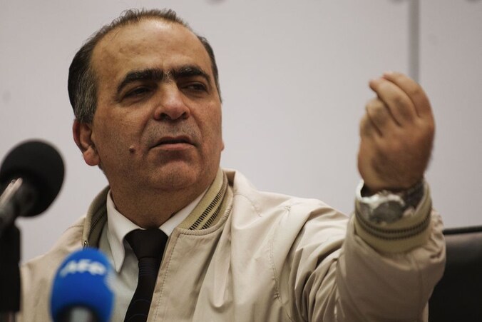 Walid Al Buni, woordvoerder van de oppositiecoalitie.