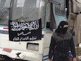 Een lid van het al-Nusra-Front in de Syrische stad Daraa.