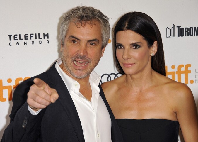 Regisseur Alfonso Cuaron en actrice Sandra Bullock op het filmfestival in Toronto