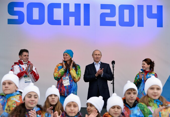 Vladimir Poetin in het olympisch dorp
