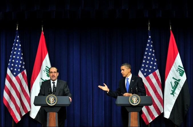 De Irakese president Maliki (L) tijdens een persconferentie met de Amerikaanse president Barack Obama.