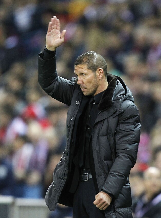 Coach Simeone was niet tevreden met de late treffer van Valencia..