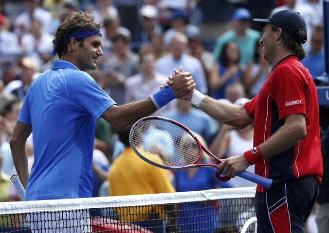 Roger Federer (l).
