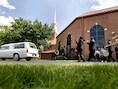 Een processie in New Orleans-stijl, donderdag tijdens de uitvaart van de overleden rapper Chris Kelly in Atlanta, Georgia.