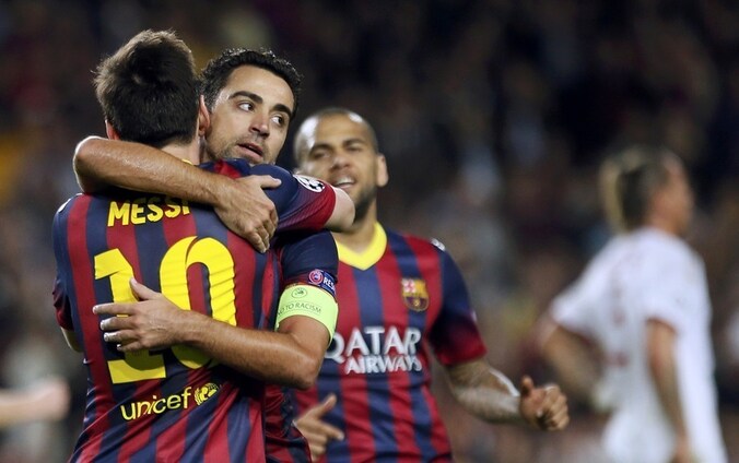 Xavi (midden).