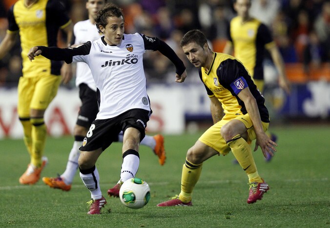 Andres Guardado (l) en Valencia maakten er in de 93ste minuut 1-1 van.