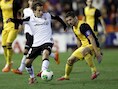 Andres Guardado (l) en Valencia maakten er in de 93ste minuut 1-1 van.