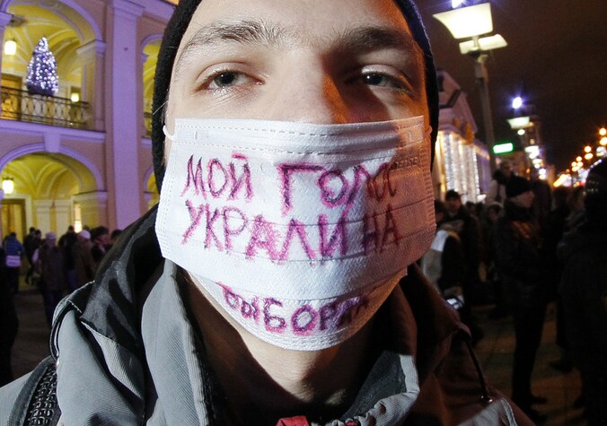"Mijn stem werd gestolen", aldus deze demonstrant in Sint-Petersburg.
