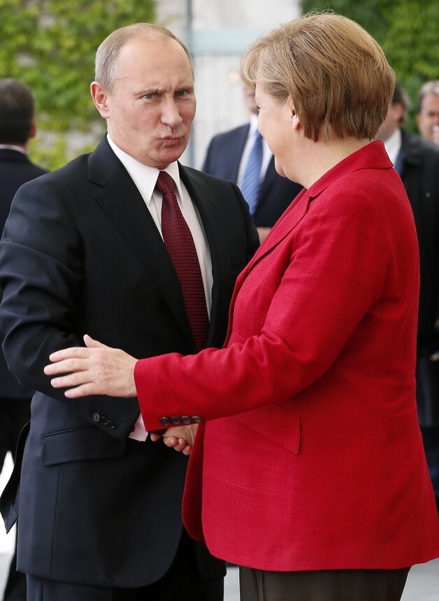 Poetin met Merkel.