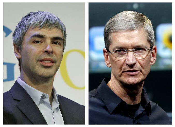 Larry Page (L), topman van Google, zou over patenten praten met Tim Cook (R) van Apple.
