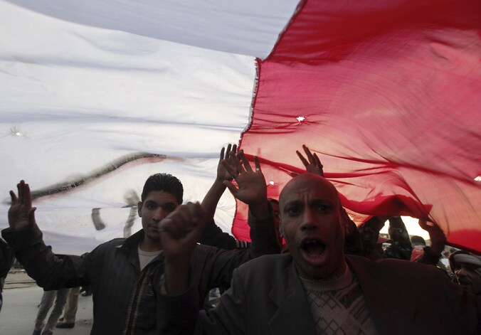 Tegenstanders van de Egyptische president Mursi in één van de vele betogingen.