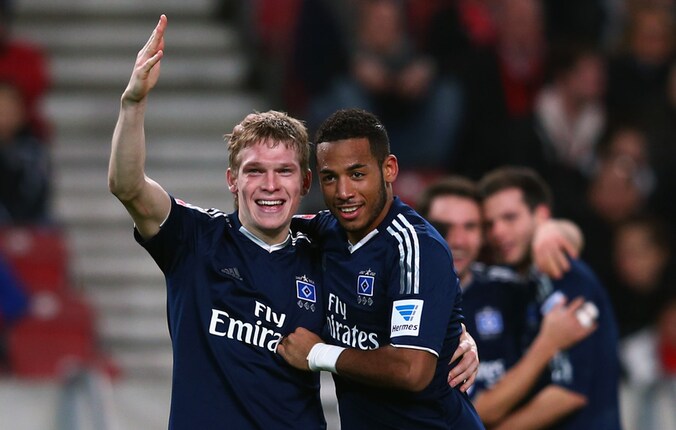 Rudnevs (l) en Aogo vieren de enige goal.