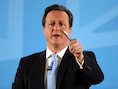 De Britse premier Cameron vindt dat migranten toegang tot de Britse verzorgingsstaat moeten verdienen, dat het geen automatisch recht is.