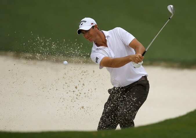 Colsaerts moet ontsnappen uit een bunker op de tiende hole in Augusta.