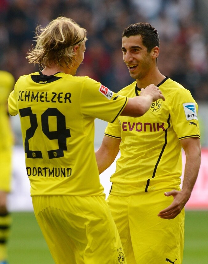 Henrikh Mkhitaryan (r) tekende voor beide treffers aan de kant van Dortmund.