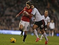 Januzaj, hier in duel met Richardson, kreeg het hard te verduren in de partij tegen Fulham.