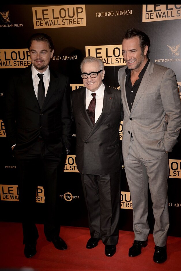 Regisseur Martin Scorcese (midden) met acteurs Leonardo Di Caprio en Franse acteur Jean Dujardin.