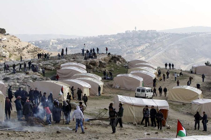 De bezetters richtten een tentenkamp op in het zogenaamde E1-gebied.